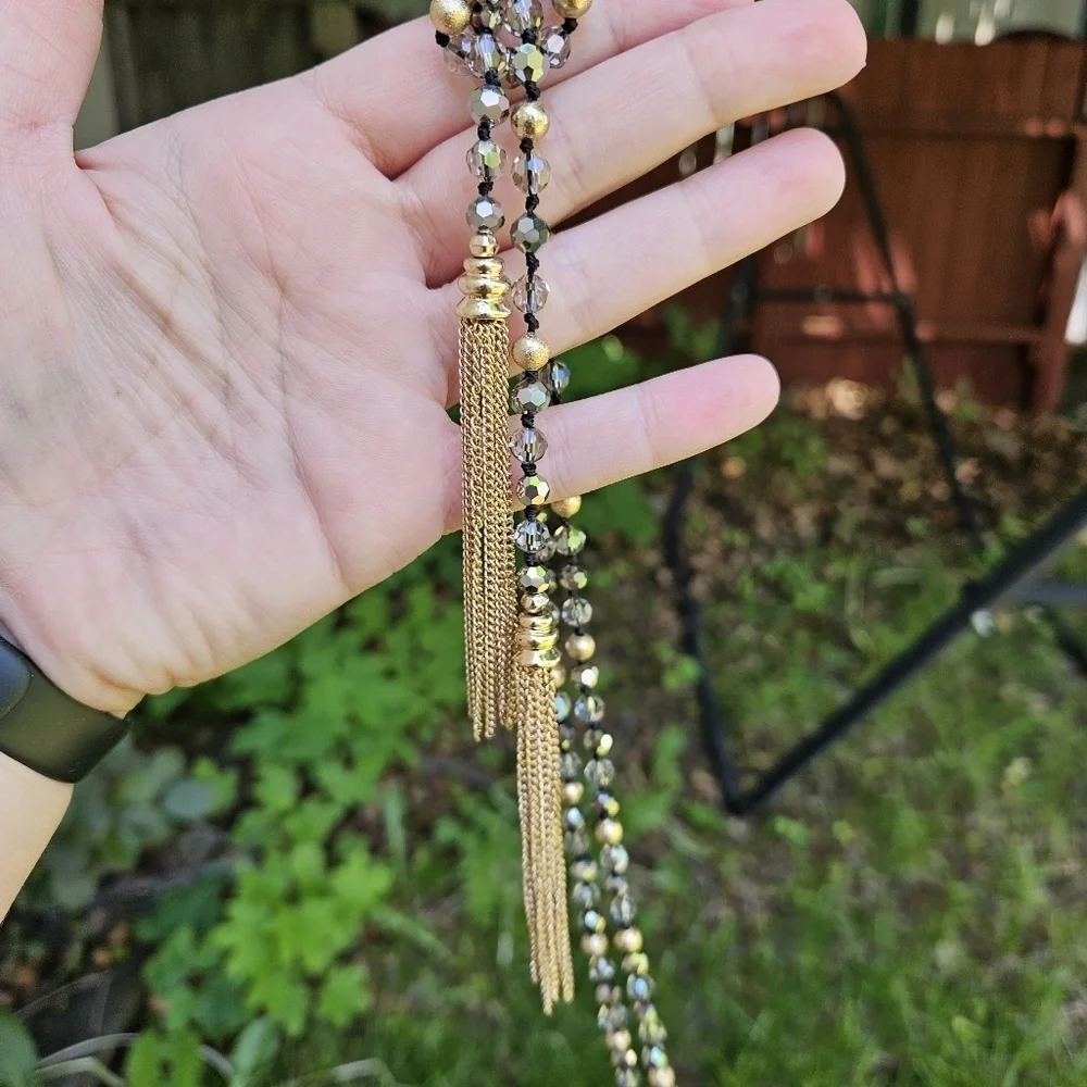 gold tone and gray crystal beaded necklace with gold chain tassel